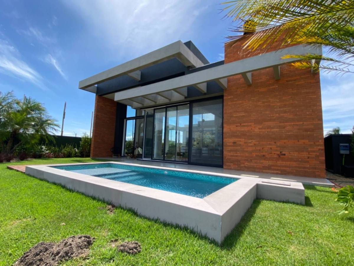 Casa em Condomínio 4 dormitórios para venda, PARQUE ANTARTICA  em Capão da Canoa | Ref.: 974